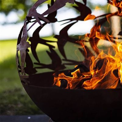 Wood Burning Laser Cut Design Oxidised Corten Steel Swallows Globe Fire Pit
